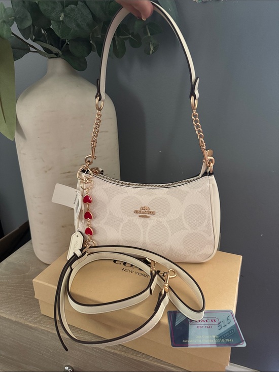 Coach Handbags - Coach Cream Signature Mini Shoulder Bag with Red Heart Charm